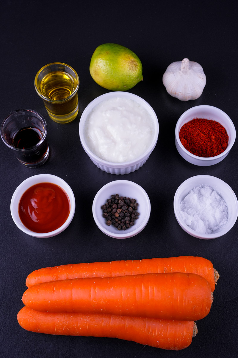 Ingredients for spicy maple roasted carrots.