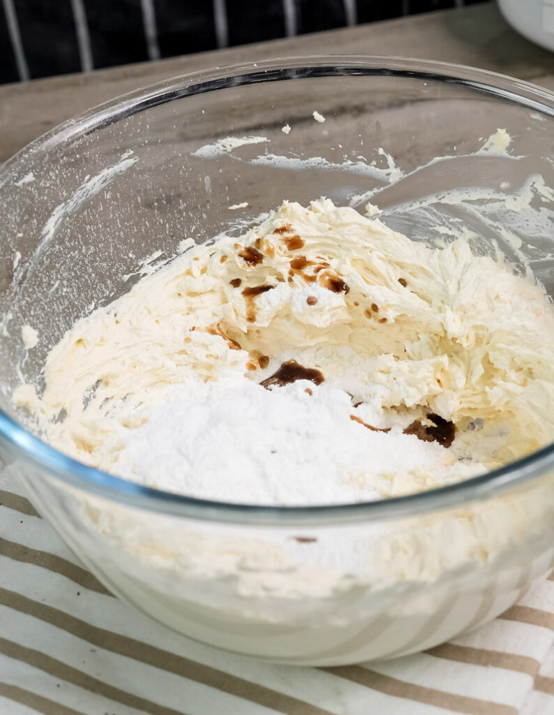 Cream cheese mixture with vanilla extract for dirt cake