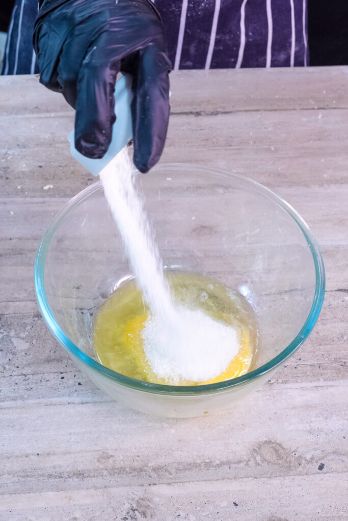 Adding flour to egg mixture for pancake roll recipe