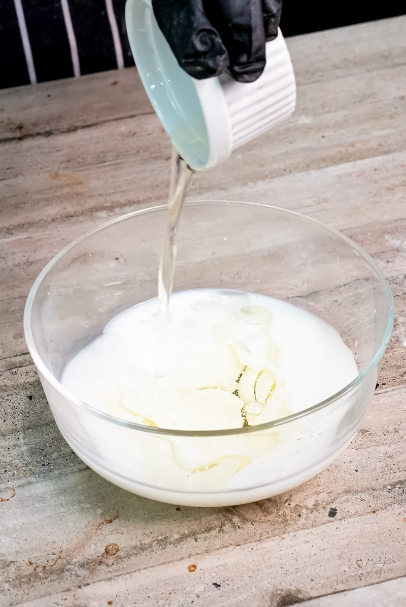 Adding melted butter to milk mixture