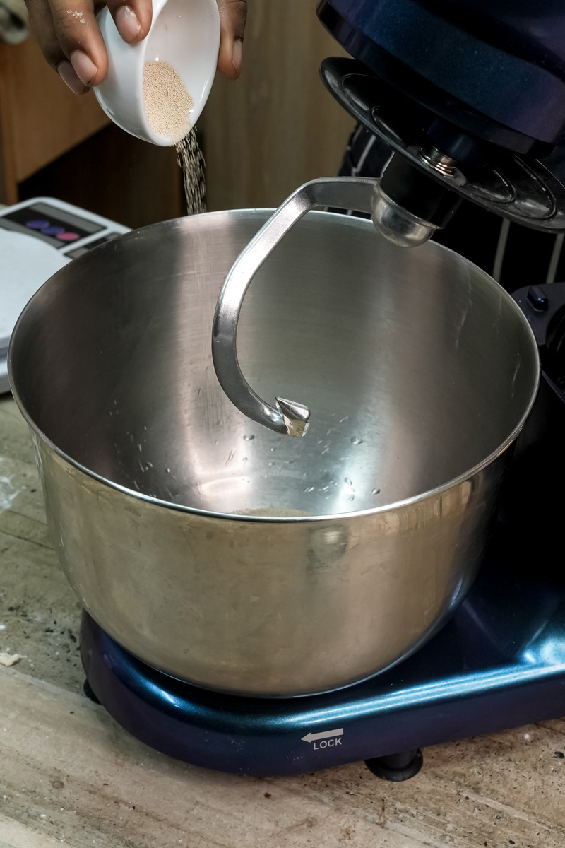 Adding yeast to stand mixer bowl for homemade buns