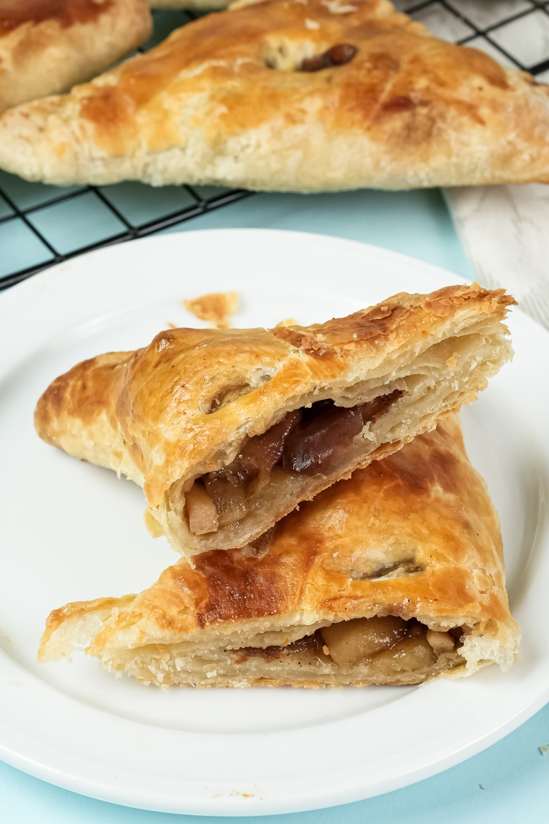 Apple turnover halved to show chunky apple filling