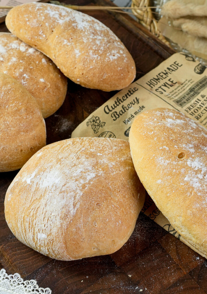 Artisanal ciabatta bread rolls with bakery wrapping
