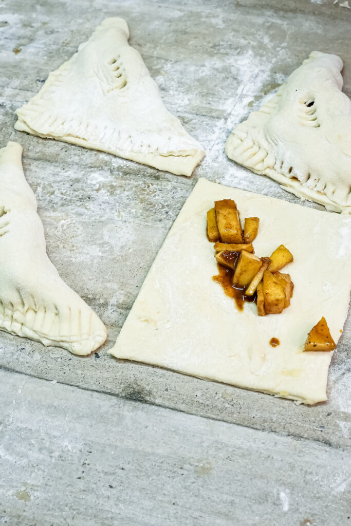 Assembled apple turnovers ready for baking