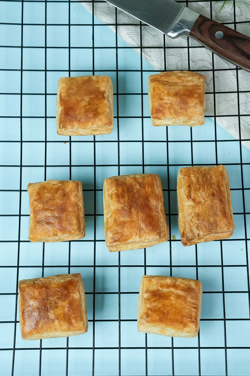 Baked puff pastry squares with golden brown tops