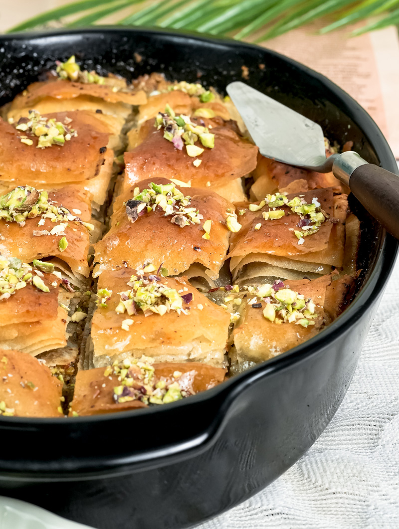 Baklava cut into squares showing flaky phyllo layers