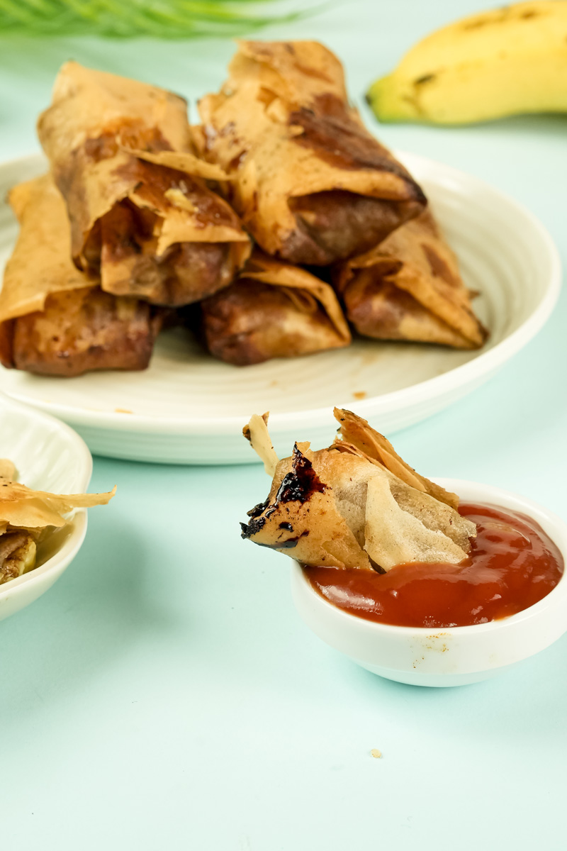 Banana lumpia rolls with sauce for dipping