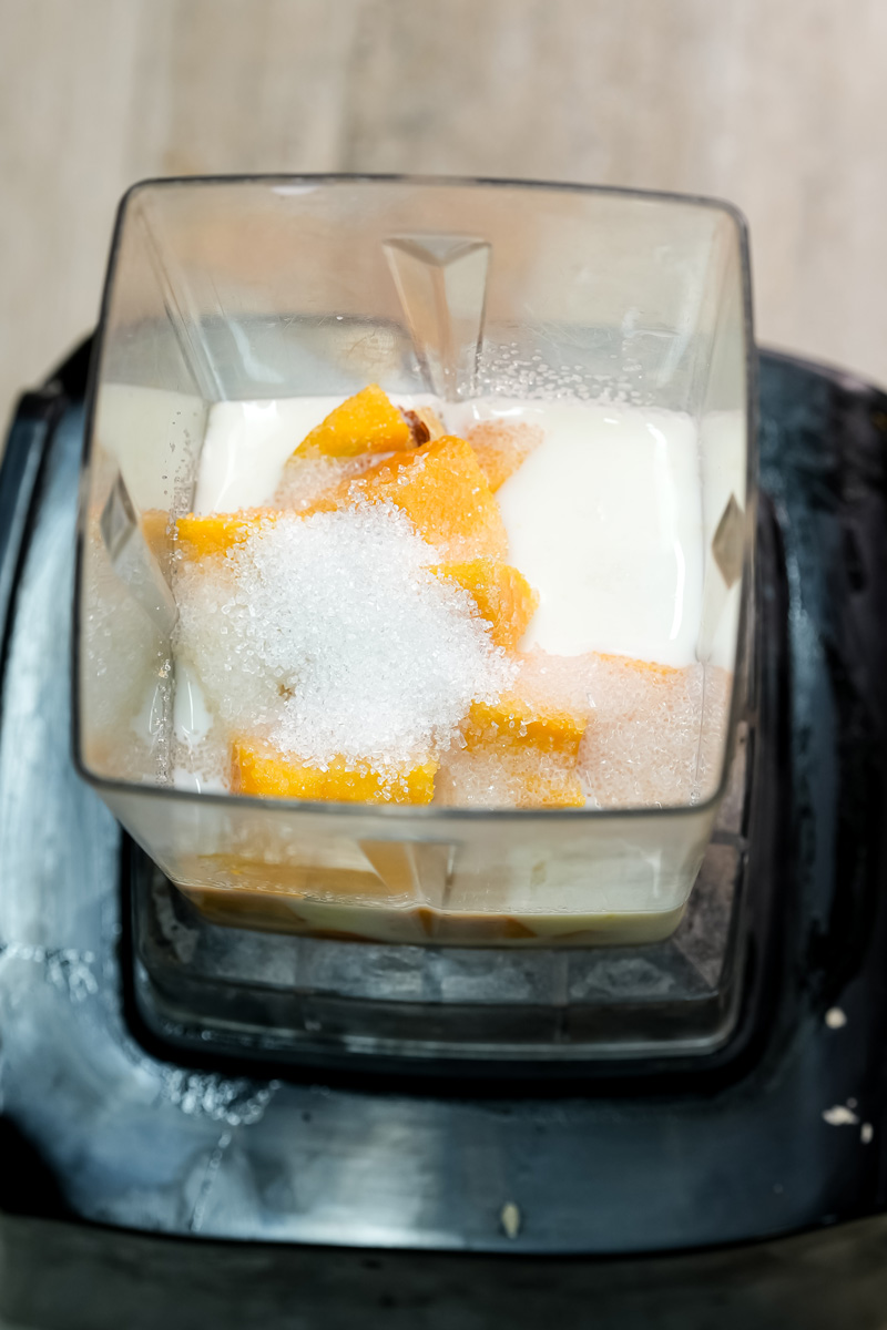Blended mango puree with mango chunks for sago dessert