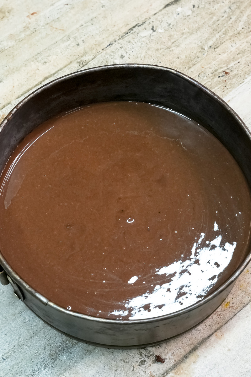 Chocolate glaze in springform pan for Ferrero Rocher cake