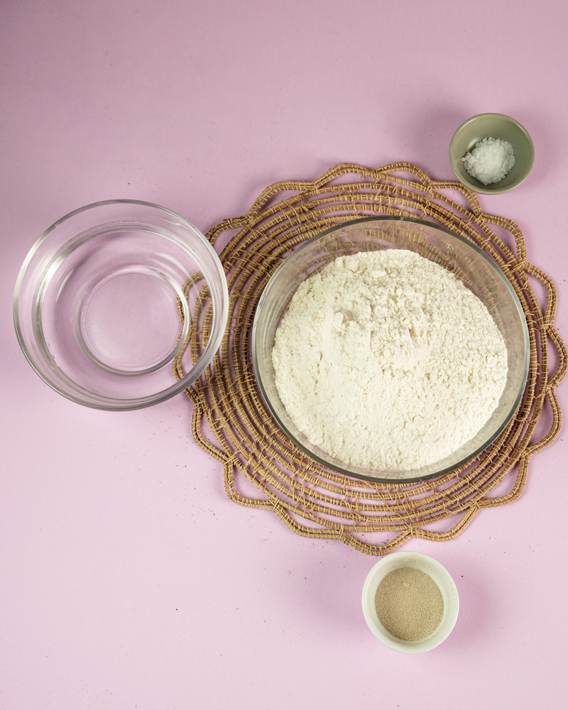 Ciabatta bread making ingredients - flour, water, salt, and yeast