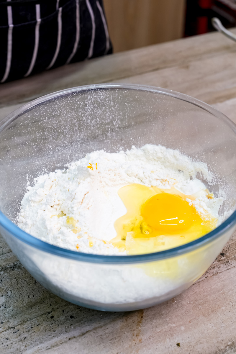 Citrus cake batter with eggs, orange juice and zest