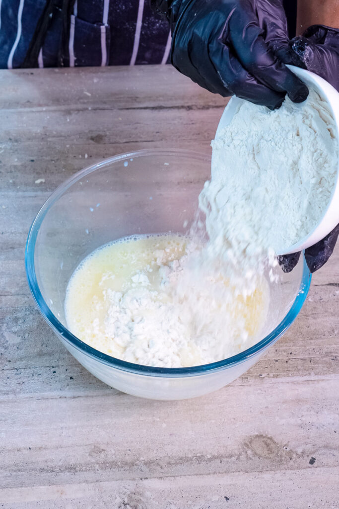 Combining flour with wet ingredients for pancake rolls