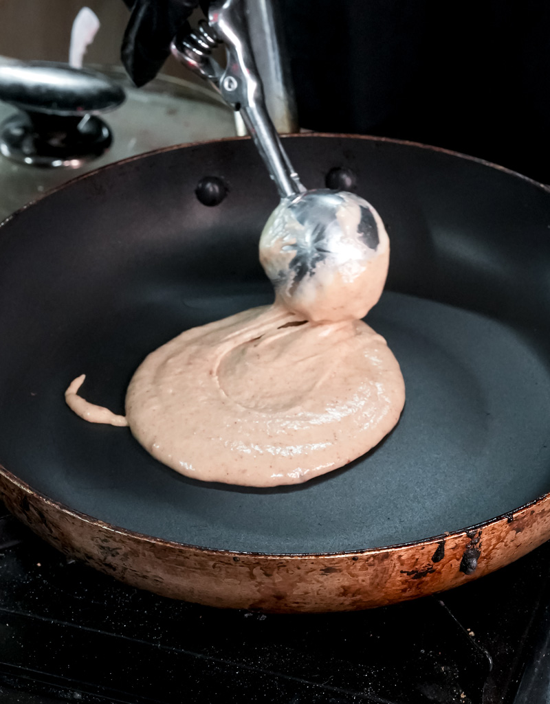 Cooking peanut butter pancake on non-stick pan