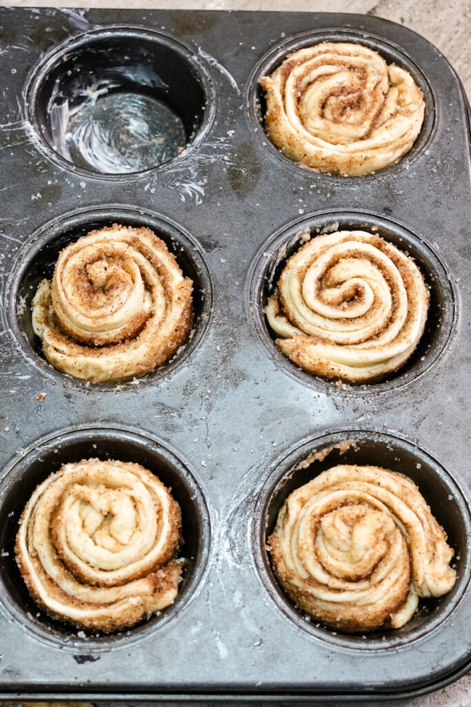 Cruffin dough ready for baking in muffin tin