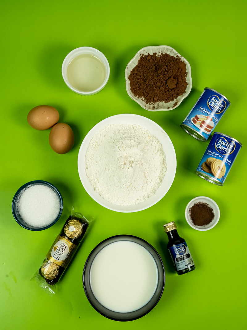 Ferrero Rocher cake ingredients - flour, eggs, cocoa powder, milk and chocolates