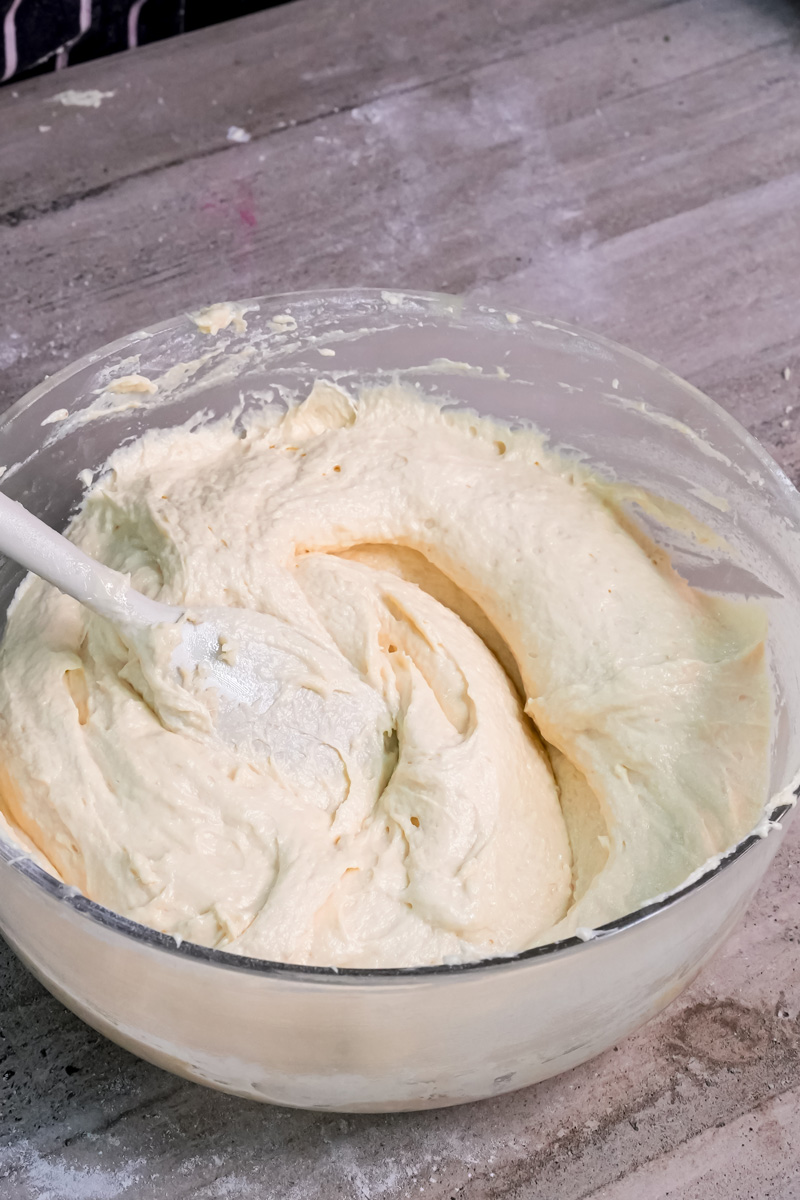 Final Battenberg cake batter being hand-mixed before baking