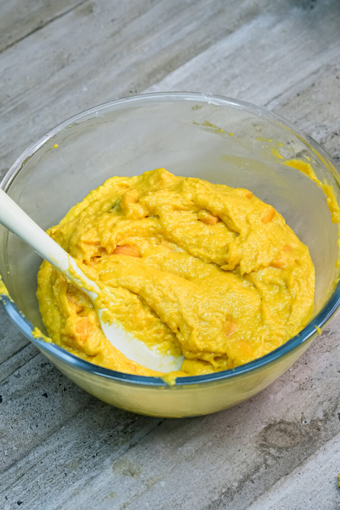 Final mango muffin batter ready for baking