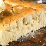 Focaccia bread showing perfect fluffy interior crumb