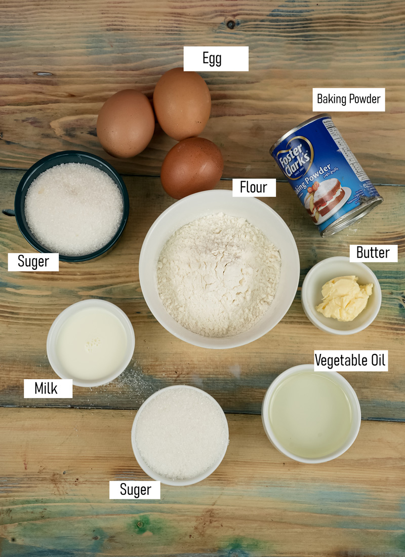 Fraisier cake ingredients including eggs, flour, sugar, milk, butter and baking powder