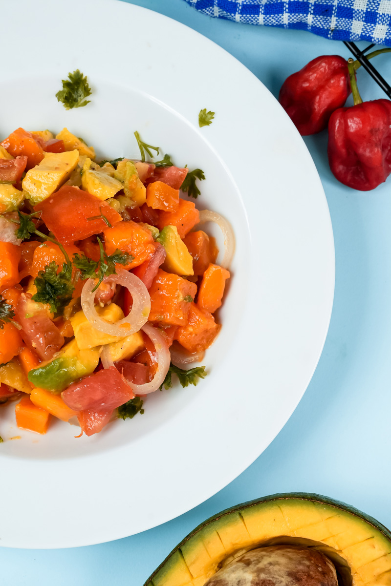 Fresh mango avocado salad with cilantro garnish