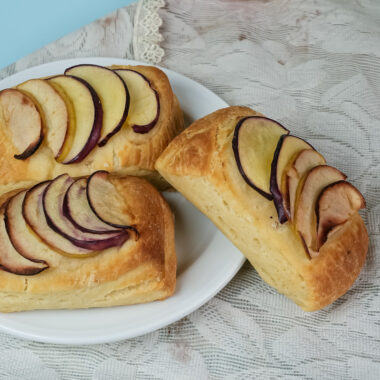 Homemade apple Danish pastries served on white plate