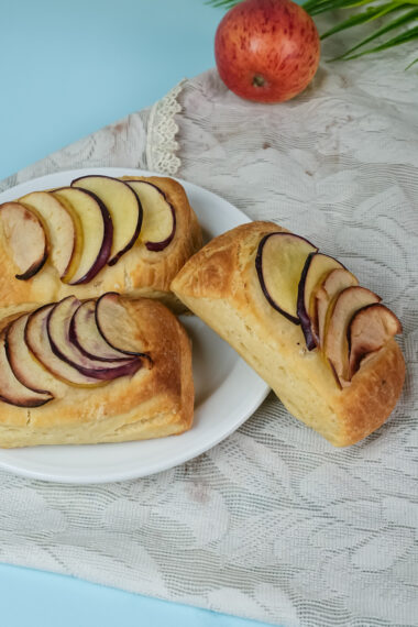 Homemade apple Danish pastries served on white plate