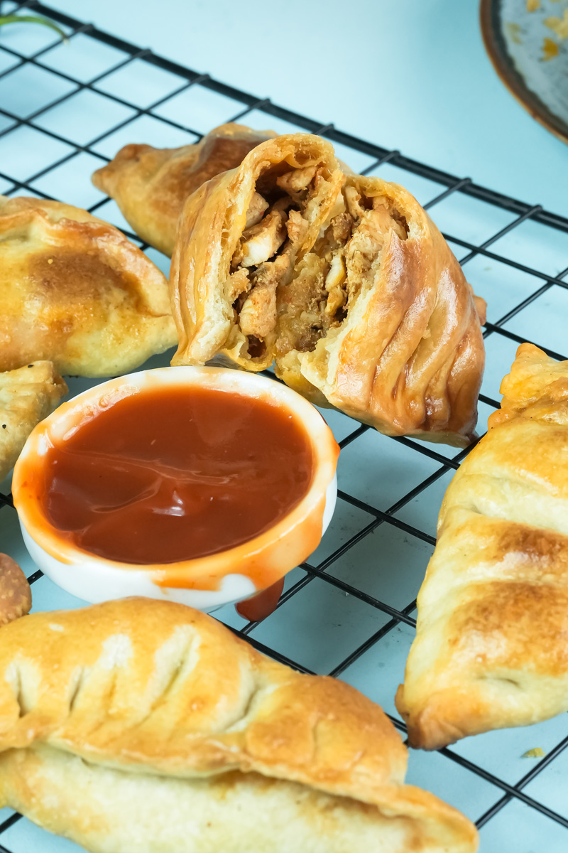 Homemade chicken empanadas with visible filling texture