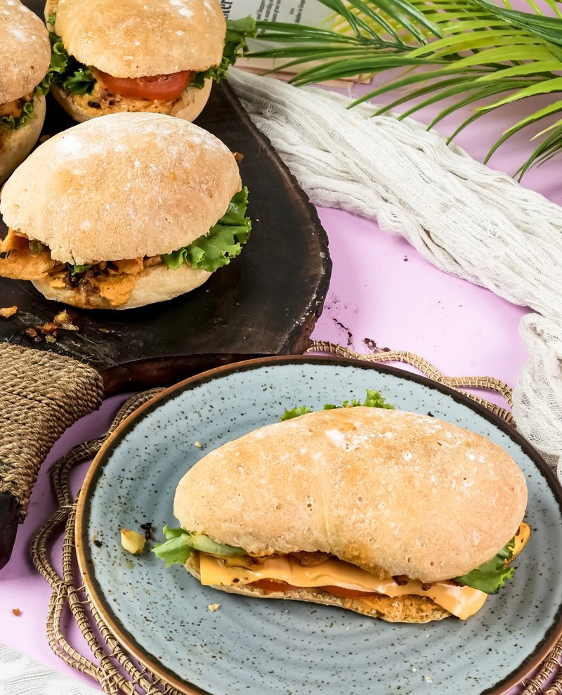 Homemade ciabatta sandwiches with fresh lettuce and cheese