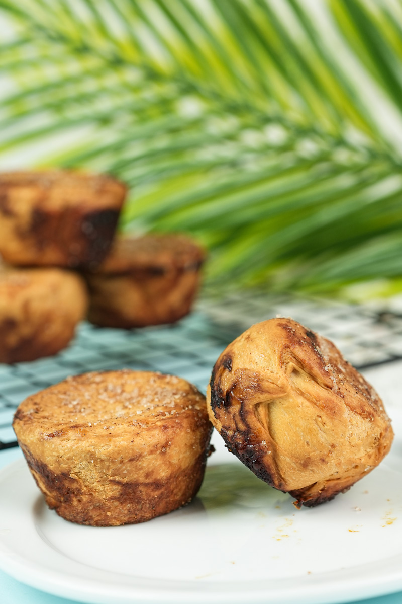 Homemade kouign amann served on white plate