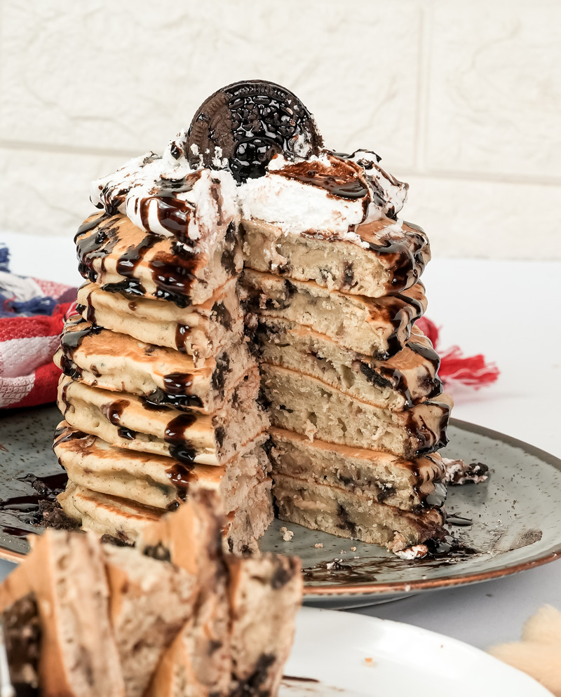 Interior view of Oreo pancakes with visible cookie chunks and syrup
