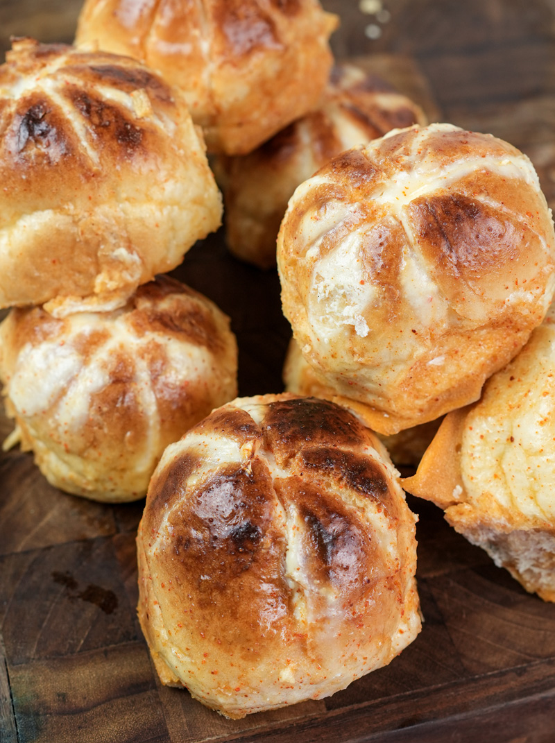 Korean buns close-up showing golden cross-hatch design