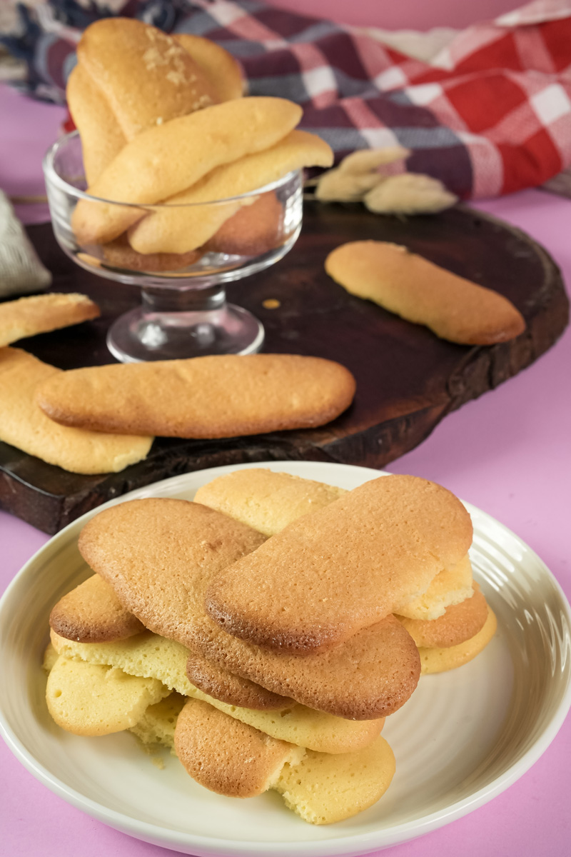 Ladyfinger cookies displayed in bowl and on plate