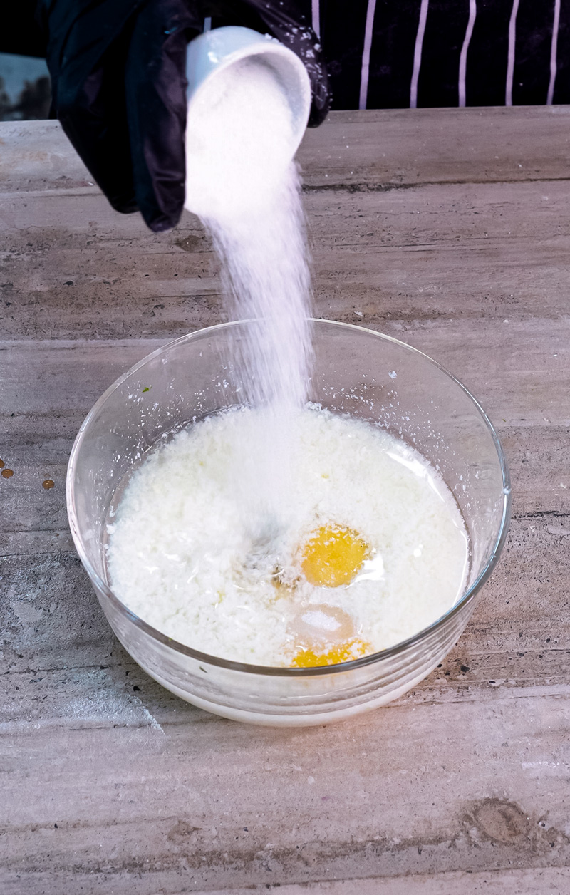 Mixing pancake batter with milk, eggs and flour
