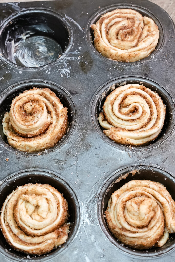 Multiple cruffin spirals arranged in muffin tin