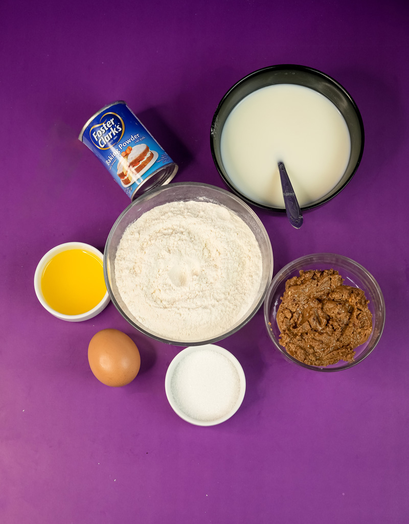 Peanut butter pancake ingredients - flour, milk, cocoa powder, egg, sugar, baking powder