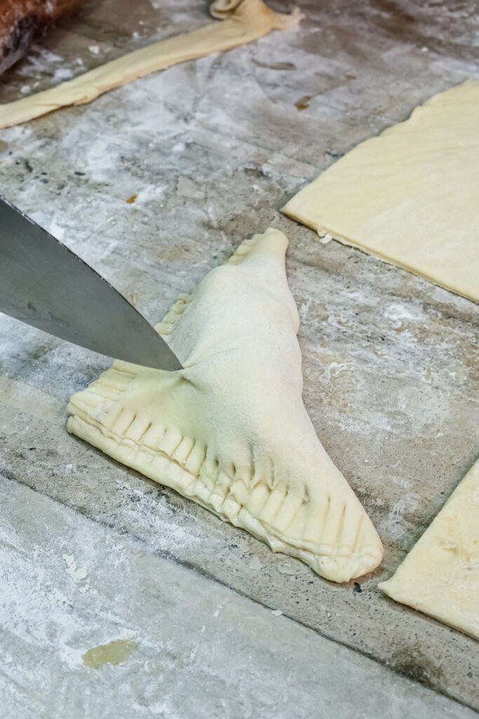 Sealing apple turnover edges with fork
