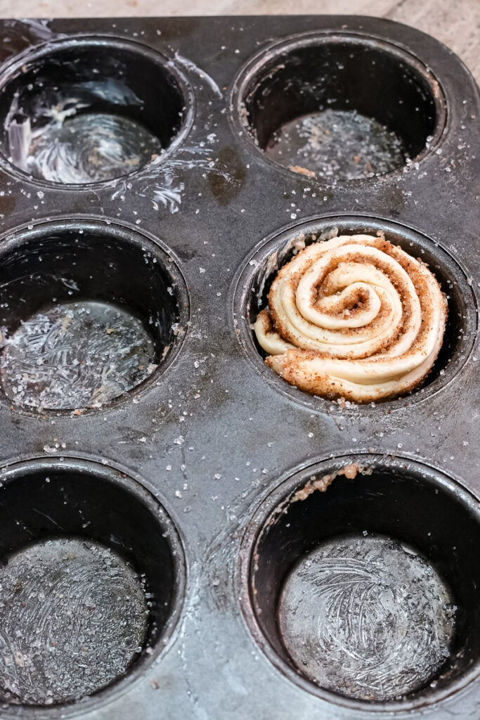 Single cruffin dough spiral in muffin cup