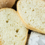 Sliced ciabatta bread showing open crumb structure