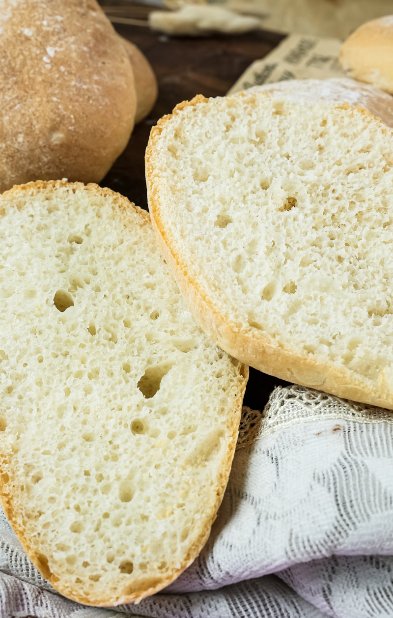 Sliced ciabatta bread showing open crumb structure