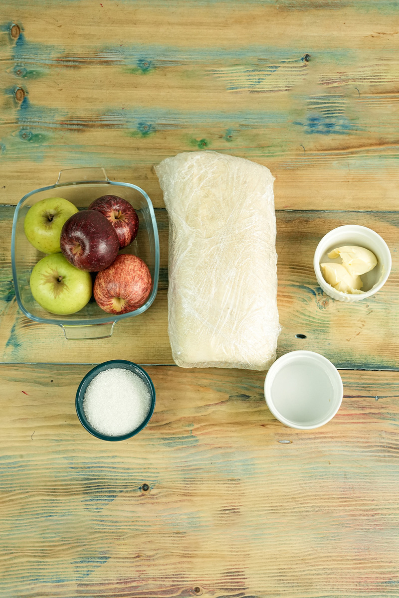 Tarte Tatin ingredients: fresh apples, puff pastry, butter and sugar