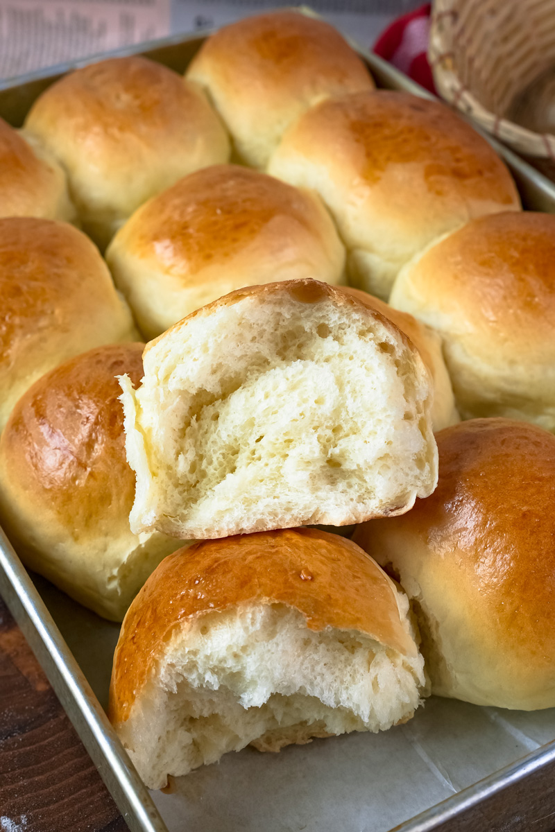 Torn bun revealing light, airy crumb structure