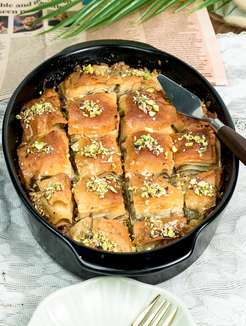 Traditional baklava dessert with pistachio garnish ready to serve
