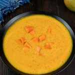 Traditional mango sago pudding with blue kitchen towel