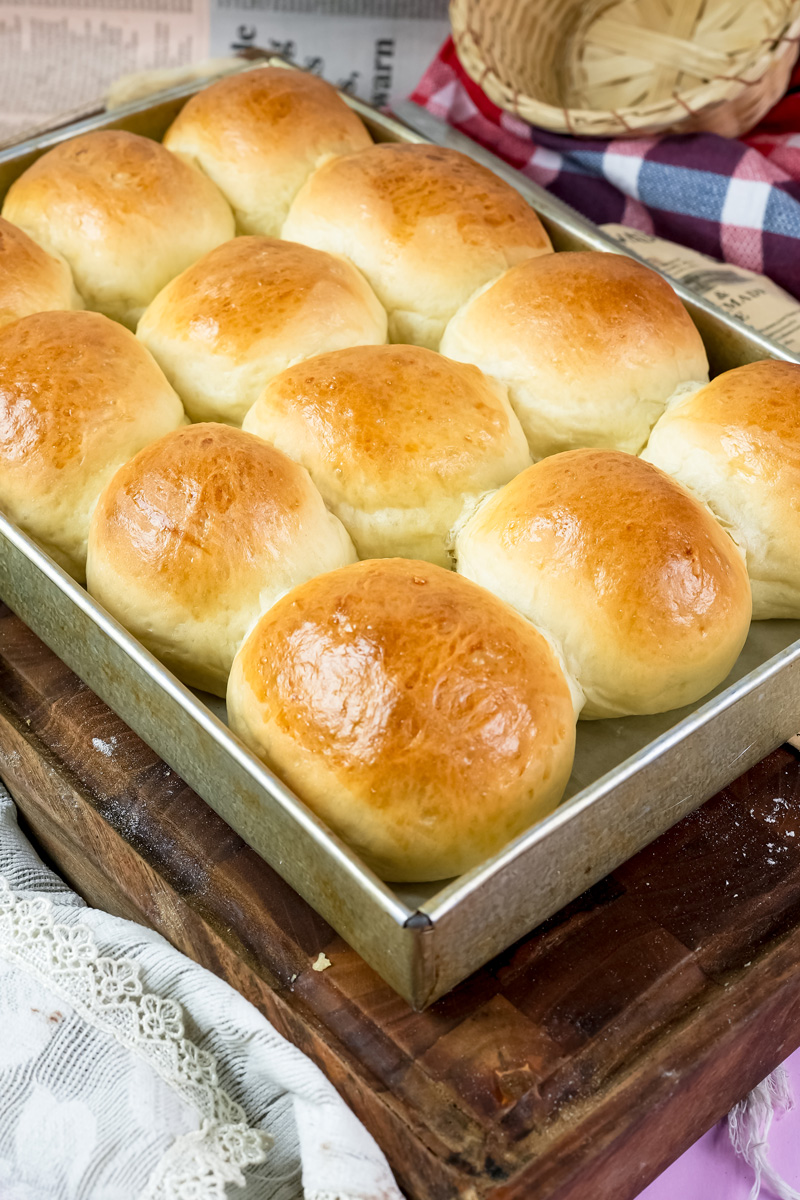 Warm homemade buns in baking tray