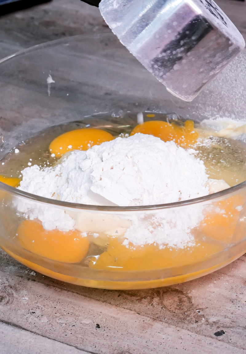 Battenberg cake ingredients: eggs, flour, butter, baking powder, food coloring
