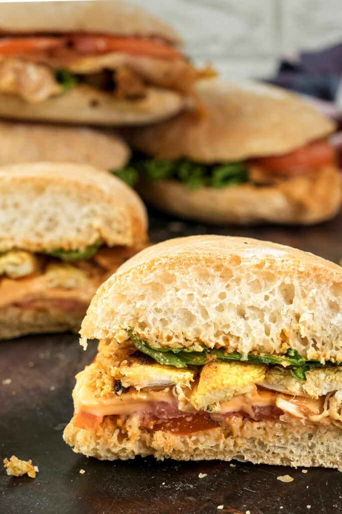 Detailed view of ciabatta sandwich showing bread holes and fillings