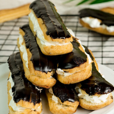 Final presentation of classic French eclairs with chocolate glaze and cream filling