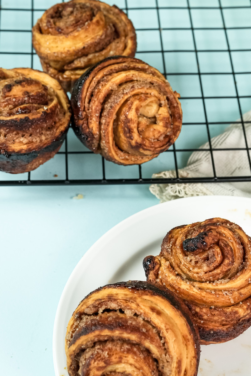 Close-up of cruffin cross-section showing buttery pastry layers
