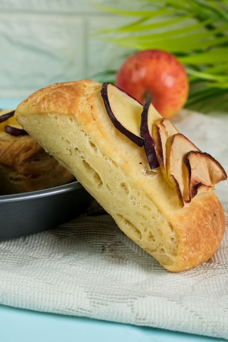 Close-up of flaky baked apple Danish pastry
