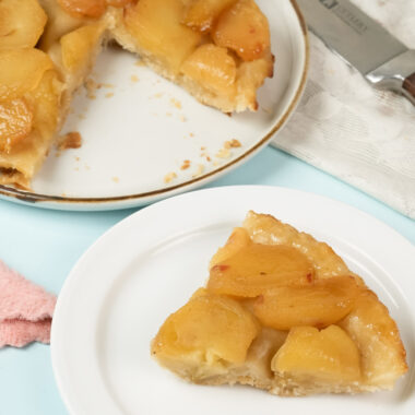 Serving homemade French apple Tarte Tatin with knife